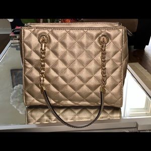 Very stylish gold Aldo purse with crossbody strap